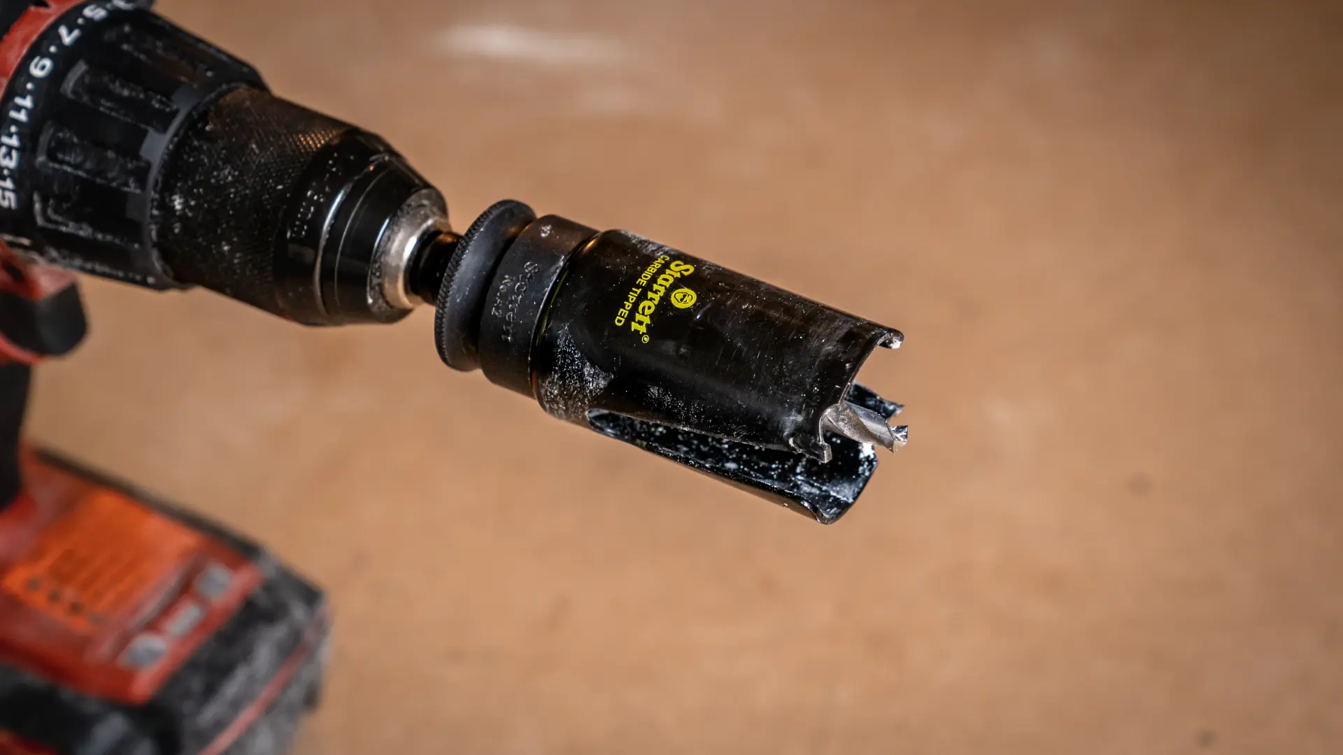 Starrett carbide tipped multi-purpose holesaw fitted to a drill